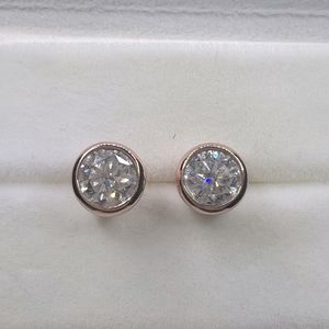 Round brilliant bezel diamond color earrings